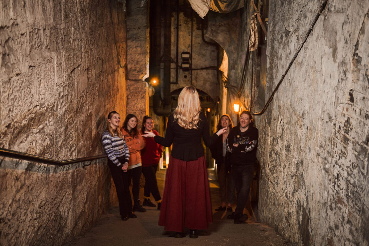 A guide leads visitors through the Real Mary King's Close in Edinburgh, Scotland. (Photo courtesy of the Real Mary King's Close)