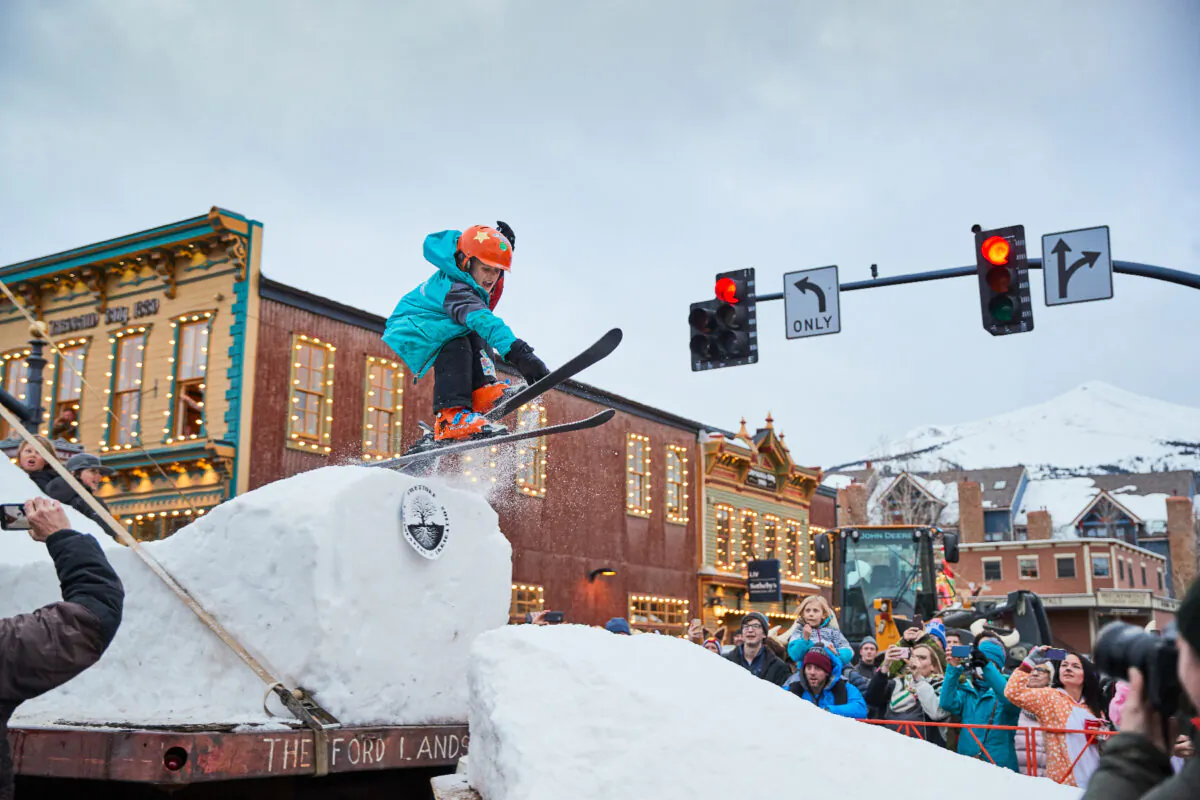 A skier jumps off of a ski-jump float in Breckenridge, Colorado's, annual Ullr Fest Parade. (Photo courtesy of Breckenridge Tourism Office)