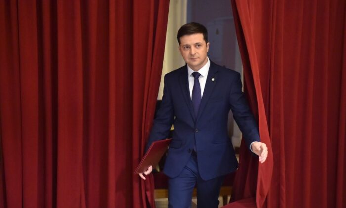 Ukrainian comic actor and the presidential candidate Volodymyr Zelensky enters a hall to take part in the shooting of the television series "Servant of the People" in Kyiv, Ukraine, on March 6, 2019. (Sergei Supinsky/AFP via Getty Images)