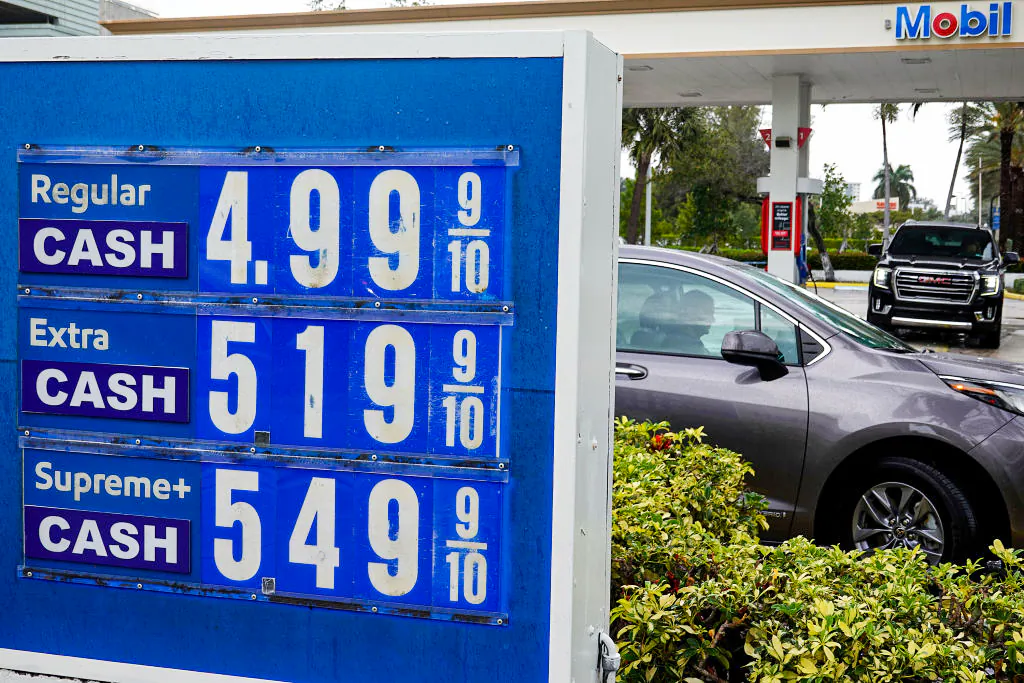 A sign reflects the price per gallon of fuel in a March 2022 file photo. (Joe Raedle/Getty Images)