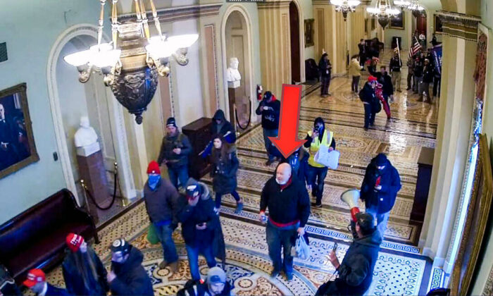 James Leslie Little walks through the U.S. Capitol on Jan. 6, 2021. (U.S. Department of Justice/Screenshot via The Epoch Times)