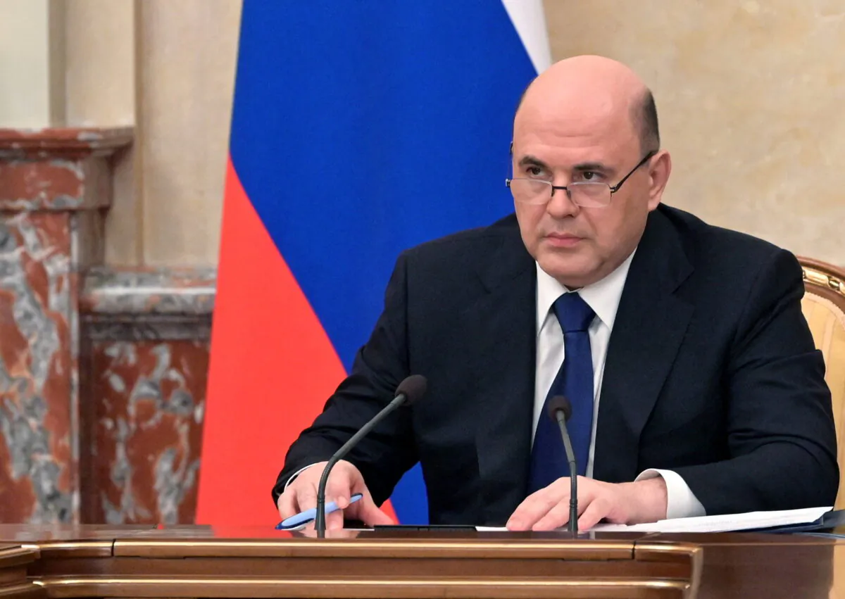 Russian Prime Minister Mikhail Mishustin chairs a meeting on improving Russia's economic resilience amid the sanctions, in Moscow, Russia, on March 11, 2022. (Alexander Astafyev/Sputnik/Pool via Reuters)