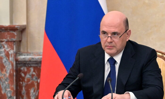 Russian Prime Minister Mikhail Mishustin chairs a meeting on improving Russia's economic resilience amid the sanctions, in Moscow, Russia, on March 11, 2022. (Alexander Astafyev/Sputnik/Pool via Reuters)