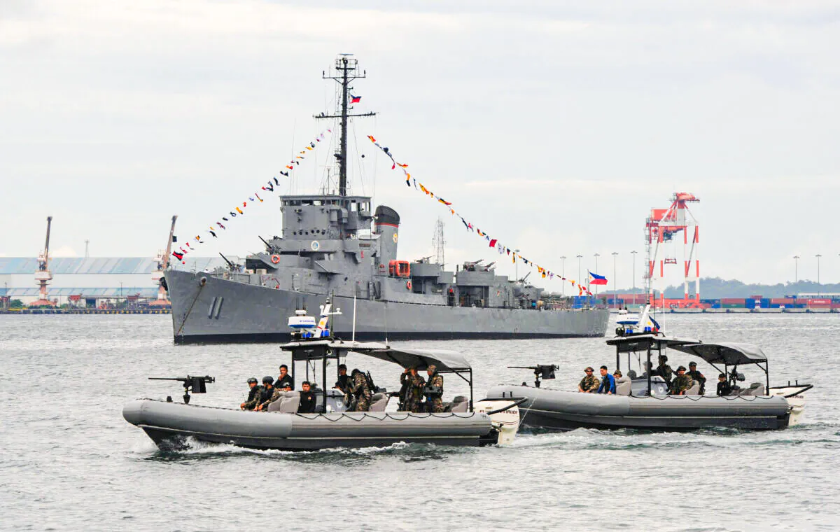 A Philippine Navy special operations group (NAVSOG) on board speed boats patrols off Subic Bay, facing the South China Sea, on Aug. 6, 2013. (Ted Aljibe/AFP via Getty Images)