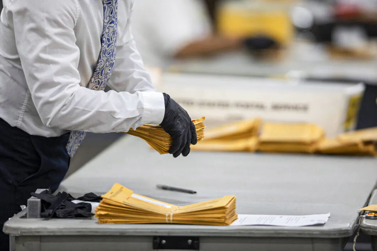 A elections worker in a November 2020 file photo. (Elaine Cromie/Getty Images)