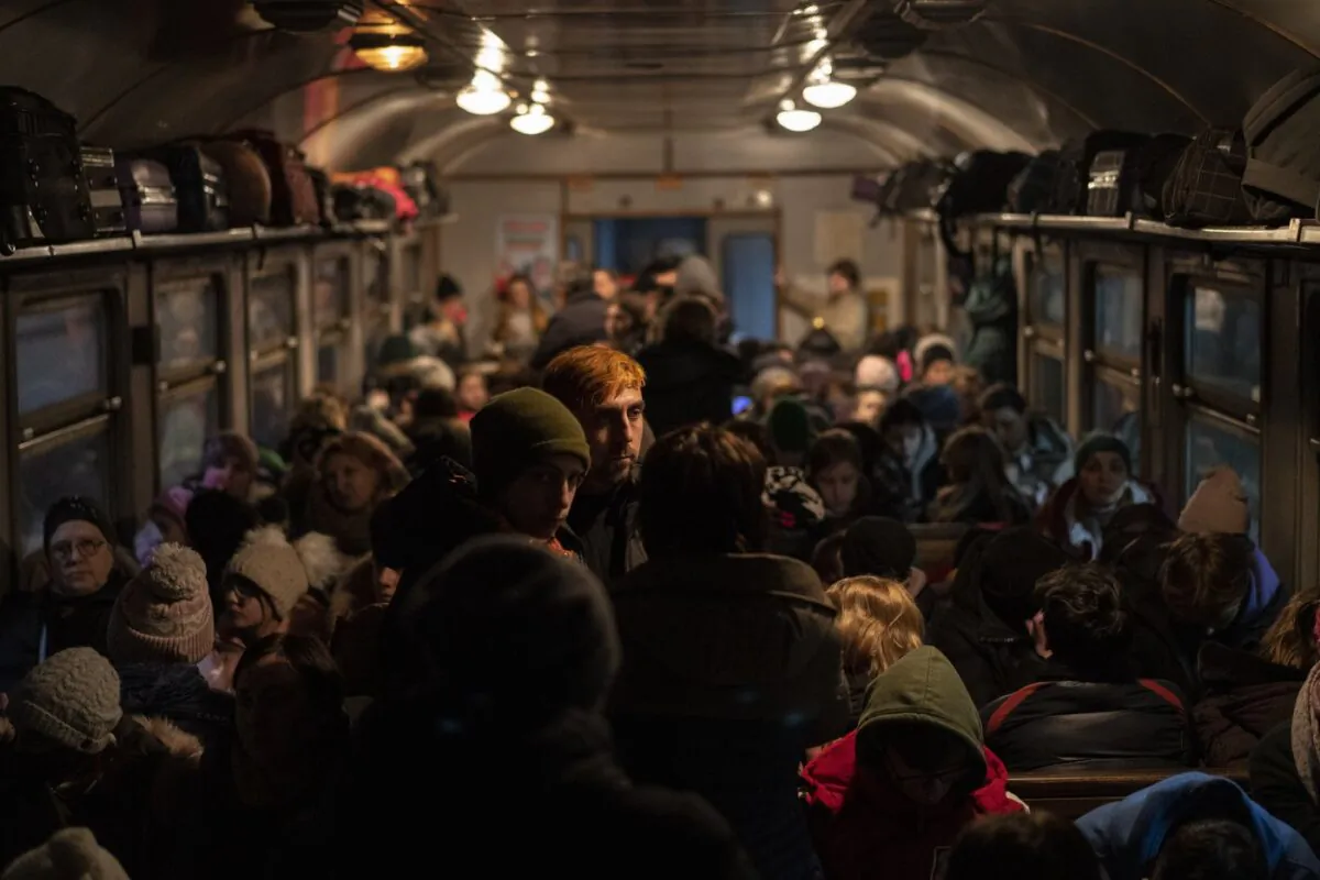Displaced Ukrainians onboard a Poland bound train in Lviv, western Ukraine, March 13, 2022. (The Canadian Press/AP-Bernat Armangue)