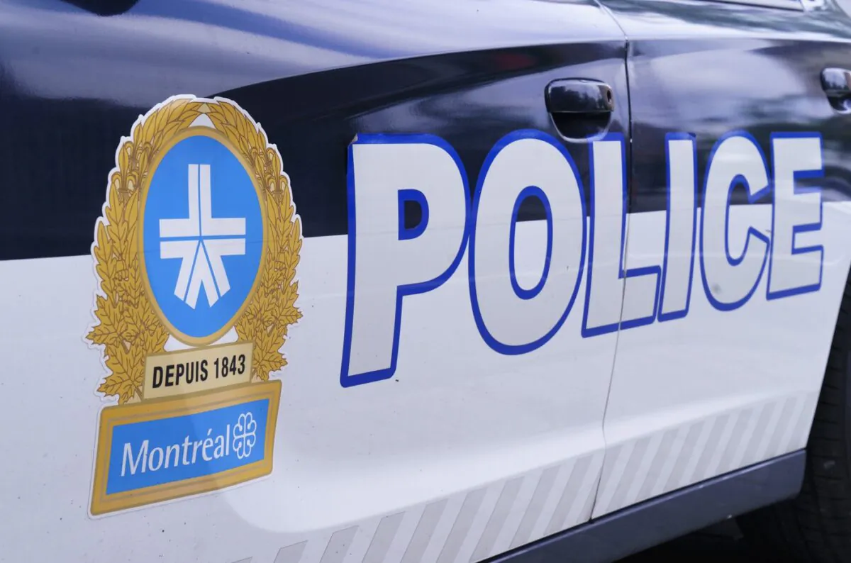 The Montreal Police logo is seen on a police car in Montreal on July 8, 2020. (The Canadian Press/Paul Chiasson)