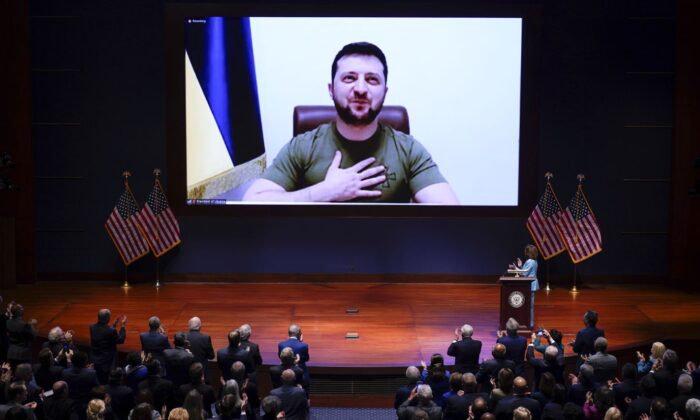  Speaker of the House Nancy Pelosi (D-CA) introduces Ukrainian President Volodymyr Zelensky to speak to the U.S. Congress at the U.S. Capitol on March 16, 2022 in Washington, DC. (J. Scott Applewhite-Pool/Getty Images)