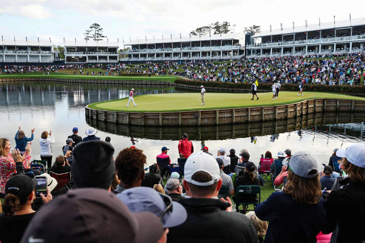 A general view is seen as Cameron Smith of Australia waves on the 17th green during the final round of THE PLAYERS Championship on the Stadium Course at TPC Sawgrass, Ponte Vedra Beach, Flor., on March 14, 2022. (Patrick Smith/Getty Images)