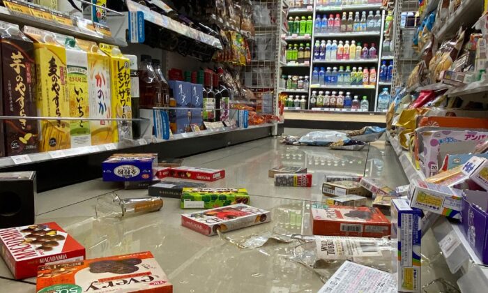 Items lay on the ground at a convenience store in Sendai, Miyagi prefecture on late March 16, 2022, after a 7.3-magnitude earthquake shook east Japan. (Jiji Press/AFP via Getty Images)