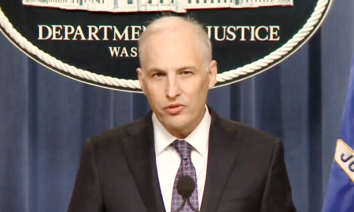 Justice Department's Assistant Attorney General for the National Security Division Matthew Olsen speaks at a press conference at the Justice Department in Washington on March 16, 2022, in a still from video. (Department of Justice/Screenshot via The Epoch Times)