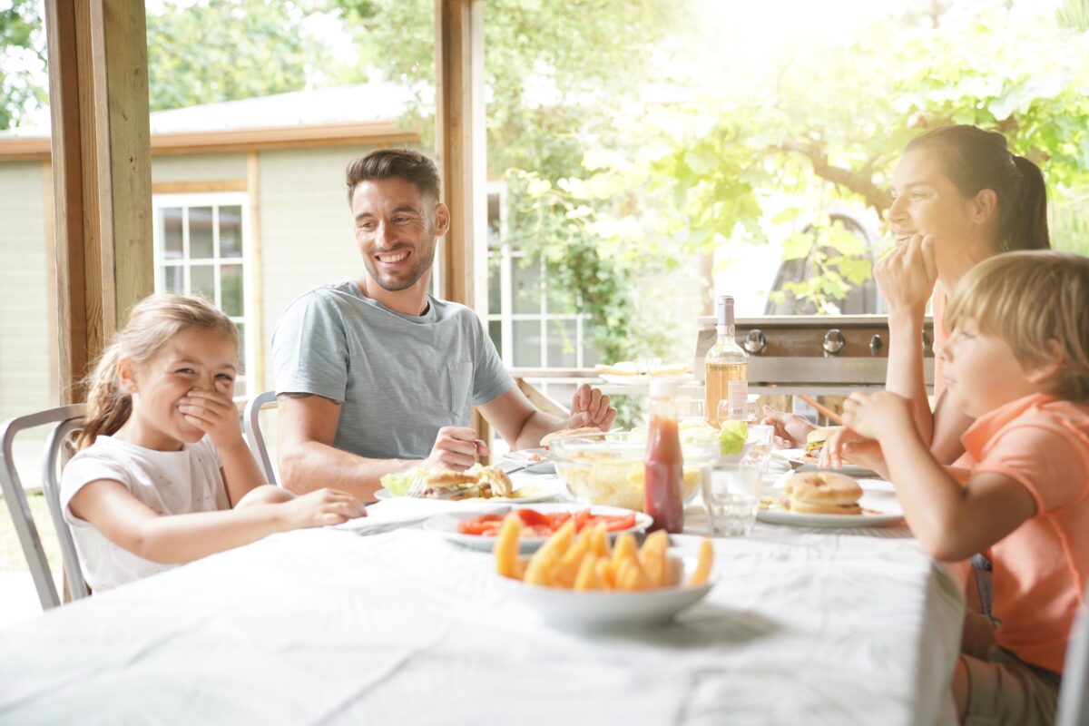 While not inexpensive, vacation rentals, whether staffed or not, can prove a better value than gathering the family at a big resort. (goodluz/Shutterstock)