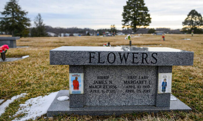 The grave of Bishop James N. Flowers, who passed away from COVID-19 in April 2020, is seen at a cemetery in Hyattsville, Maryland on Feb. 23, 2021. (Andrew Caballero-Reynolds/AFP via Getty Images)