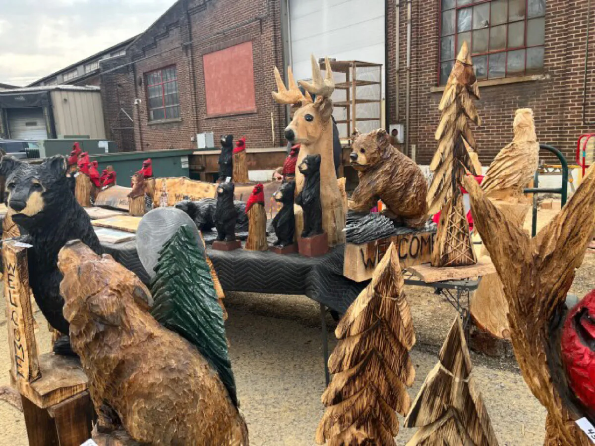 Several chainsaw craftsmen and artisans displayed their work outside the old tannery at Mountain Fest. (Salena Zito)