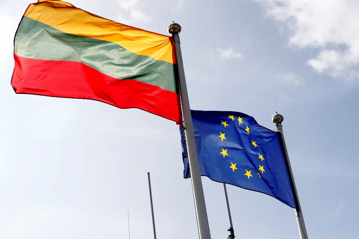 European Union and Lithuanian flags flutter at border crossing point in Medininkai, Lithuania, on Sep. 18, 2020. (Ints Kalnins/Reuters)