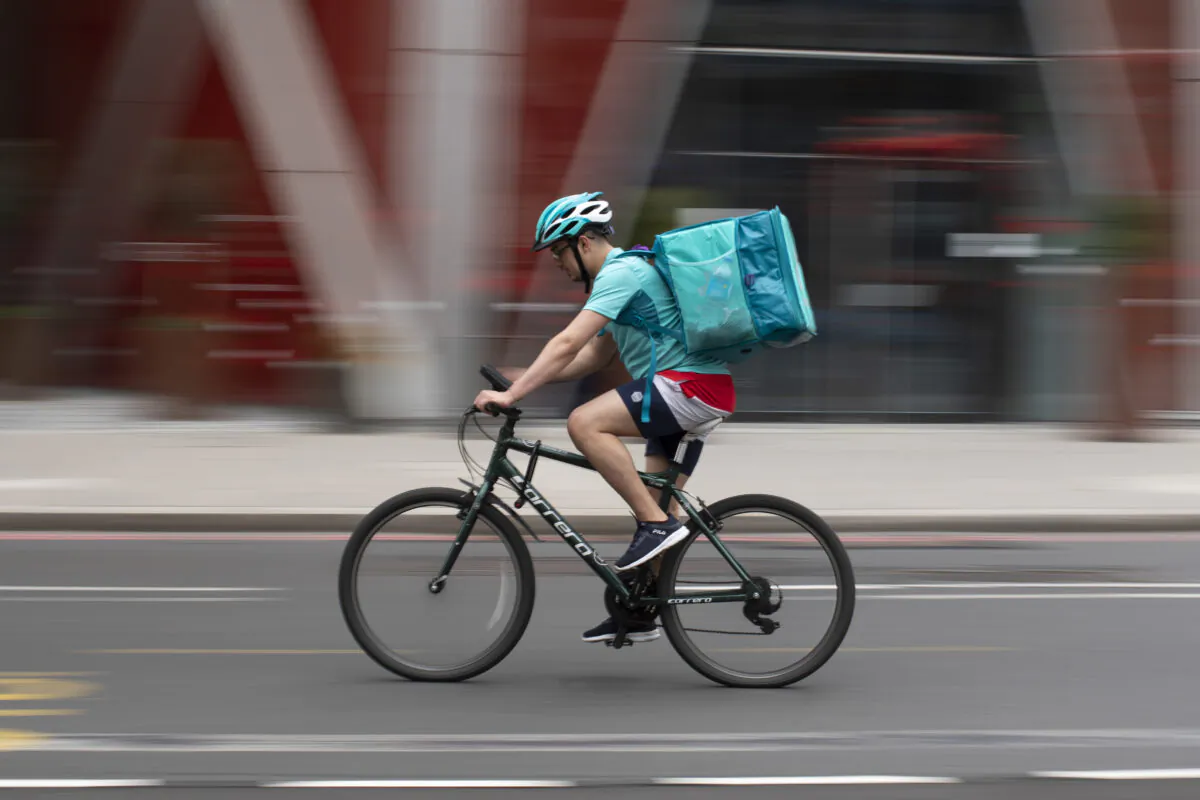 A Deliveroo rider near Victoria station in London on March 31, 2021. (Dan Kitwood/Getty Images)