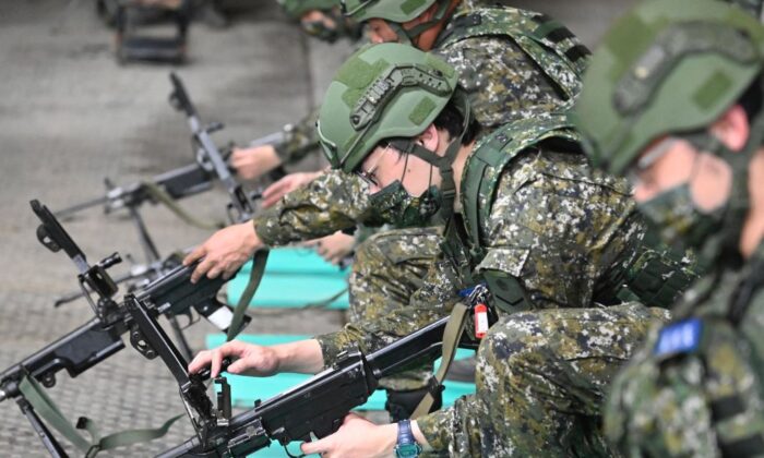 Taiwanese reservists take part in a military training at a military base in Taoyuan on March 12, 2022. (Sam Yeh / AFP) (Photo by SAM YEH/AFP via Getty Images)