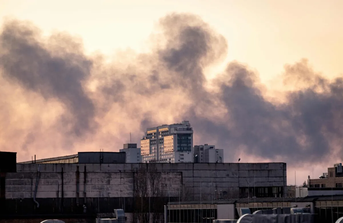 Smoke rises after an explosion in Kyiv on March 17, 2022 as Russian troops try to encircle the Ukrainian capital as part of their slow-moving offensive. (FADEL SENNA/AFP via Getty Images)