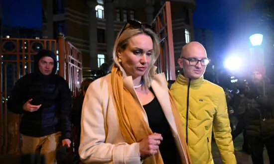 Russian On-air Protester Fined, Faces Possible Prison Term