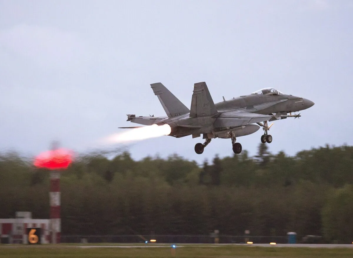 An RCAF CF-18 takes off from CFB Bagotville, Quebec, on June 7, 2018. (Andrew Vaughan/The Canadian Press)