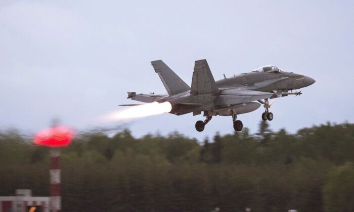 An RCAF CF-18 takes off from CFB Bagotville, Que. on June 7, 2018. (The Canadian Press/Andrew Vaughan)