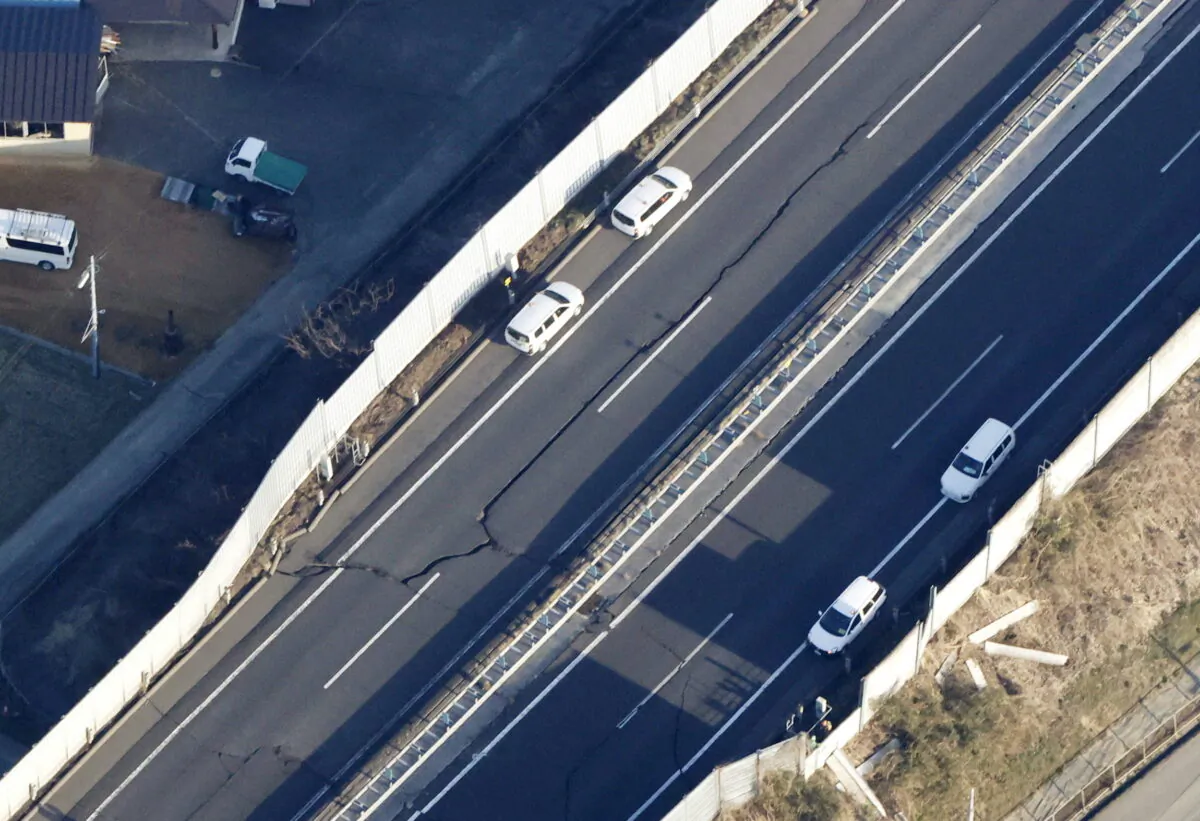 Cracks on a road following a strong earthquake are pictured in Shiroishi, Miyagi prefecture, Japan, on March 17, 2022. (Kyodo via Reuters)