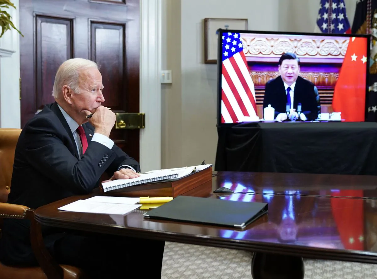 President Joe Biden meets with Chinese leader Xi Jinping during a virtual summit from the Roosevelt Room of the White House on Nov. 15, 2021. (Madel Ngan/AFP/Getty Images)