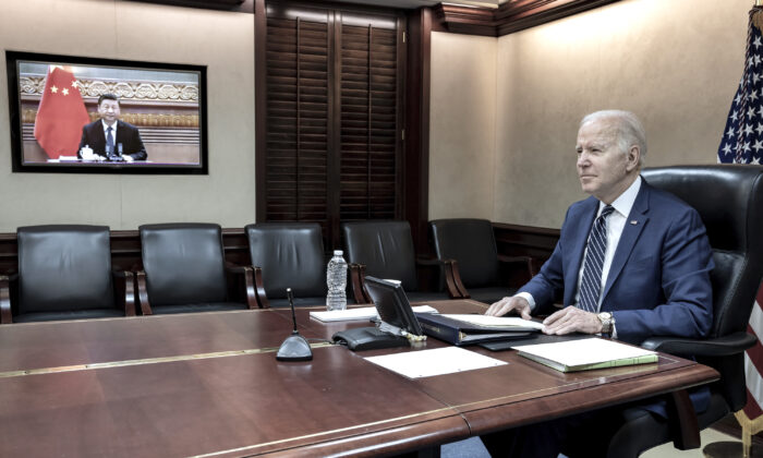 President Joe Biden meets virtually from the Situation Room at the White House with Chinese leader Xi Jinping, on March 18, 2022. (The White House via AP)