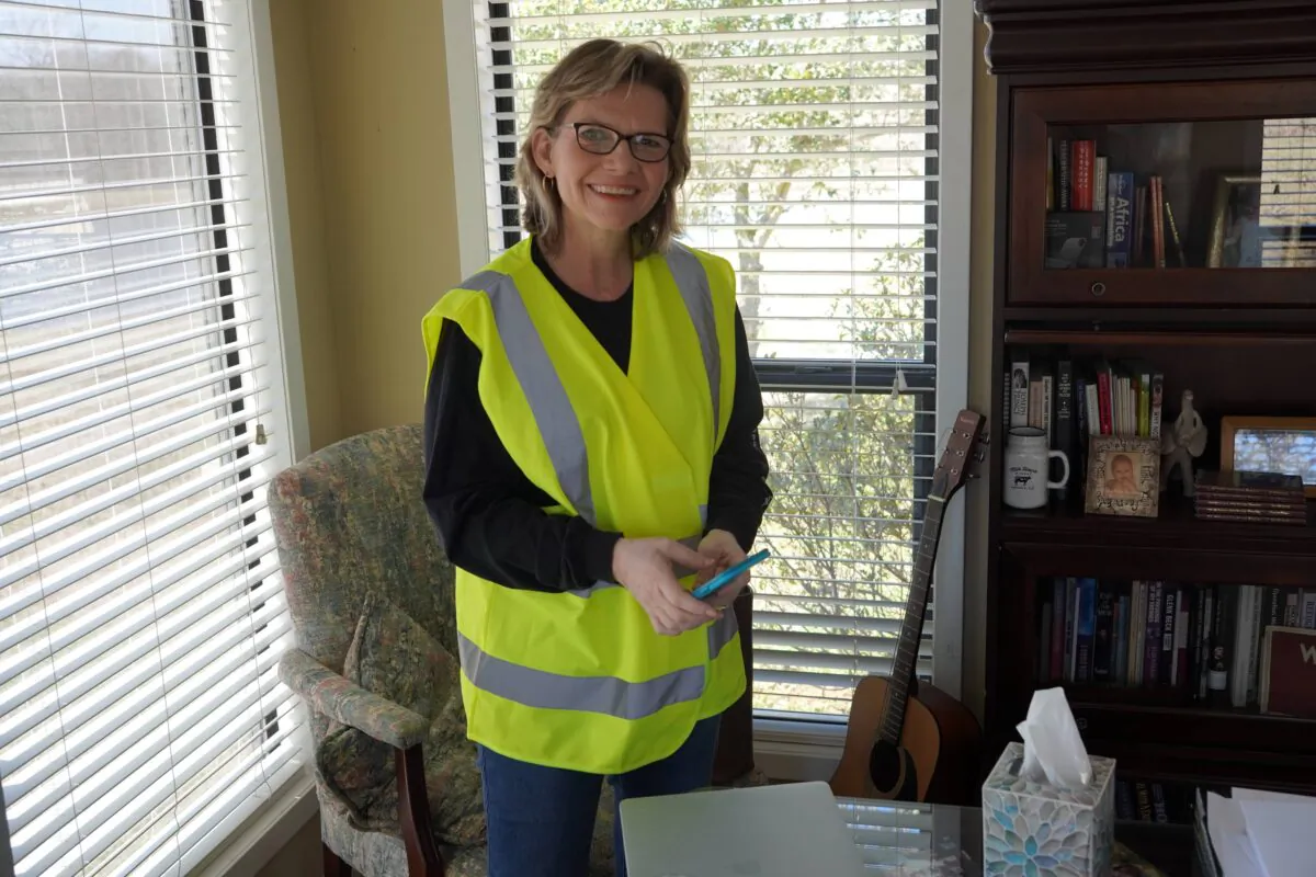 Director of Mercy Works Debbie Lascelles, prepares on March 17, to fly to Poland March 18 with the first group of volunteers seeking to aid refugees coming across the border. “There are about 200 people lining up to volunteer with us,” she told The Epoch Times. “This team of volunteers will be there for two weeks, then we will send other teams, anywhere and everywhere.” (Patrick Butler/Epoch Times)
