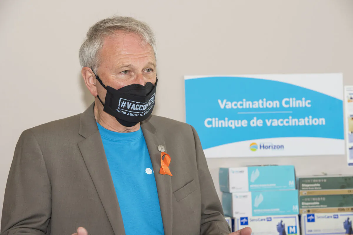 New Brunswick Premier Blaine Higgs speaks with the media after receiving his second dose of the Oxford-AstraZeneca COVID-19 vaccine, in Fredericton on June 4, 2021. (Stephen MacGillivray/The Canadian Press)