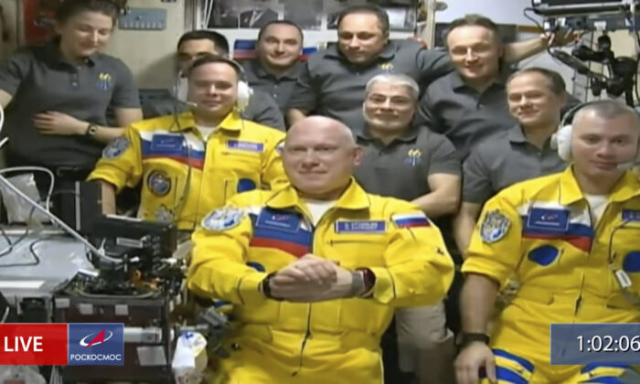 Russian astronauts Sergei Korsakov, Oleg Artemyev, and Denis Matveyev grabbed this frame grab from video at a welcoming ceremony after their arrival on March 18, 2022 at the International Space Station.  (via Roscosmos AP)