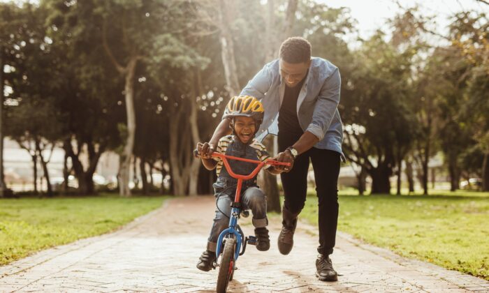 Fathers play a crucial role in their children’s lives. (Jacob Lund/Shutterstock)
