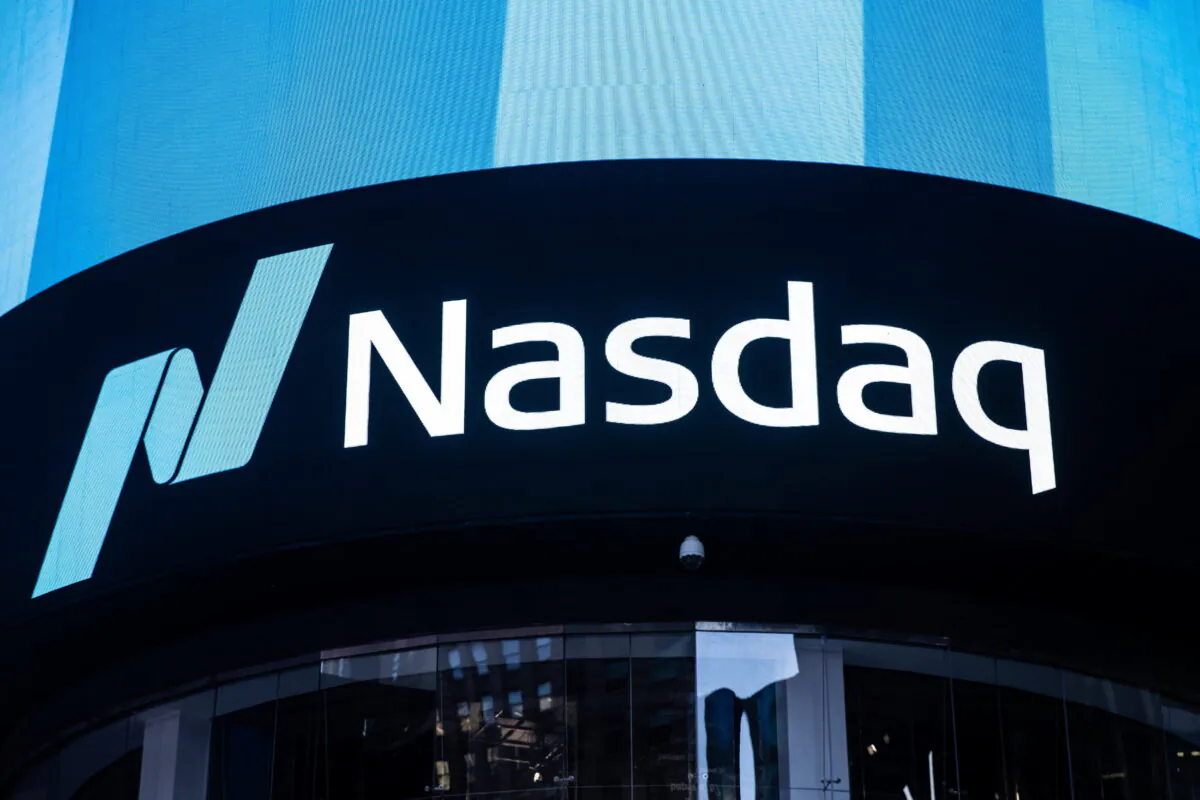 The Nasdaq logo is displayed at the Nasdaq Market site in Times Square in New York City on Dec. 3, 2021. (Reuters/Jeenah Moon