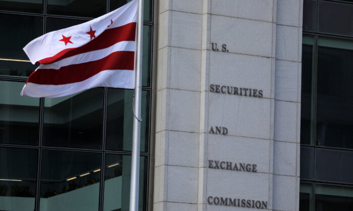 Signage is seen at the headquarters of the U.S. Securities and Exchange Commission (SEC) in Washington on May 12, 2021.   REUTERS/Andrew Kelly