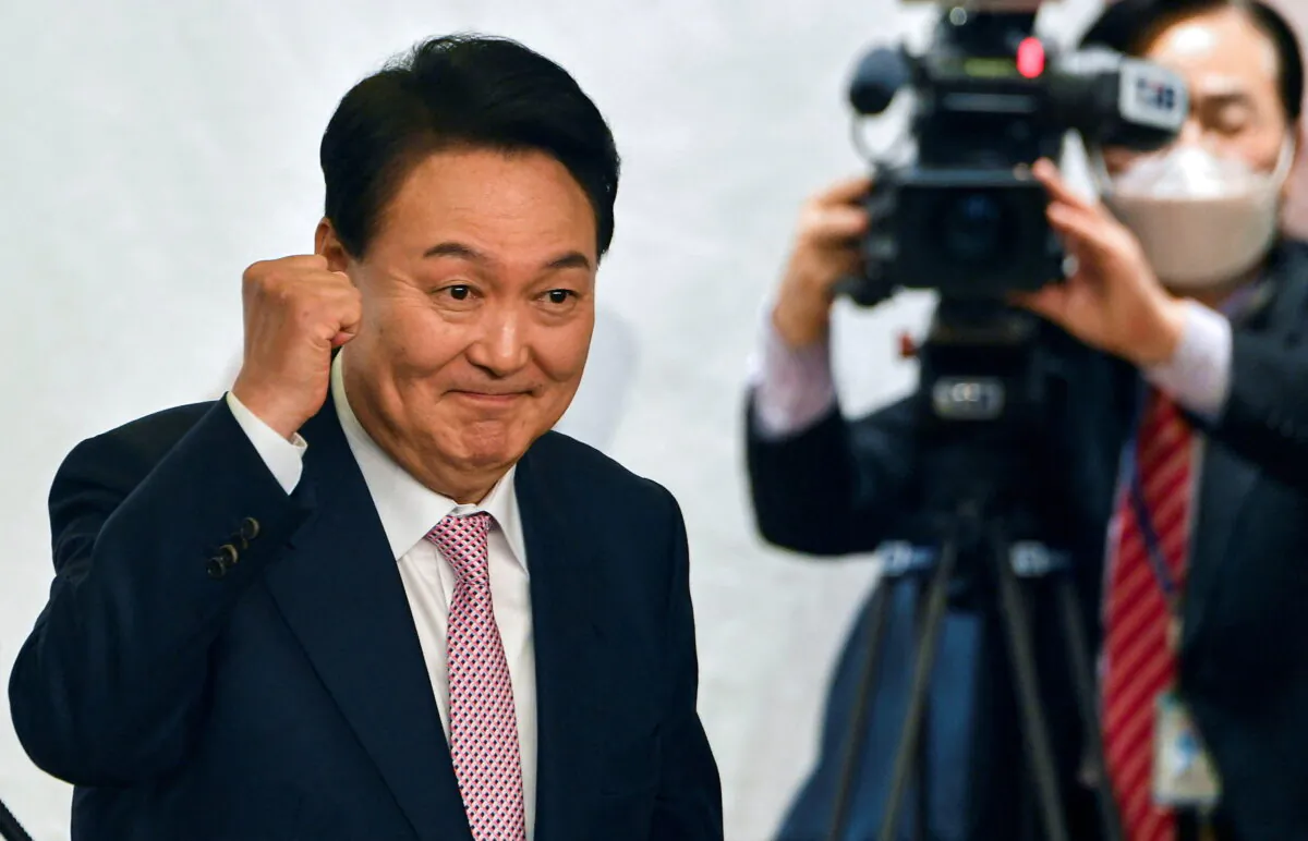 South Korea's president-elect Yoon Suk-yeol attends a ceremony of disbanding his presidential election camp at the National Assembly Library in Seoul, South Korea, on March 10, 2022. (Song Kyung-seok/Pool via Reuters)