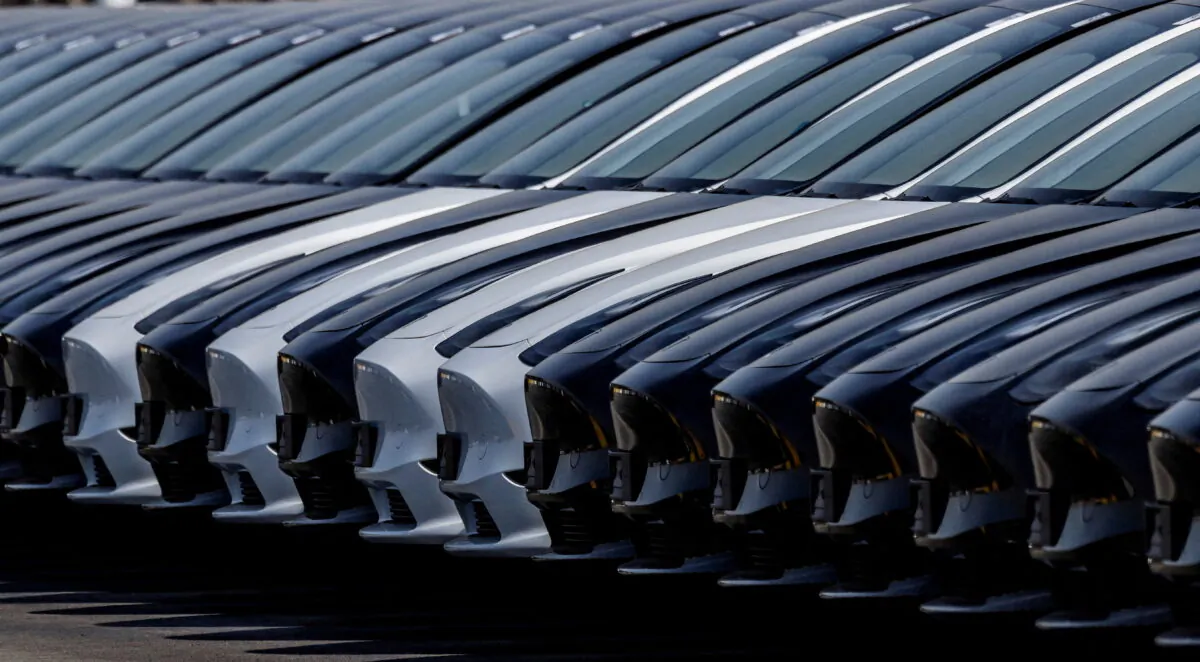 Tesla cars are seen parked at the construction site of the new Tesla Gigafactory for electric cars in Gruenheide, Germany, March 20, 2022. (Hannibal Hanschke/Reuters)