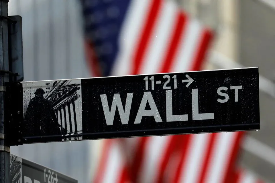 Raindrops hang on a sign for Wall Street outside the New York Stock Exchange in Manhattan, New York City, on Oct. 26, 2020. (Mike Segar/Reuters)