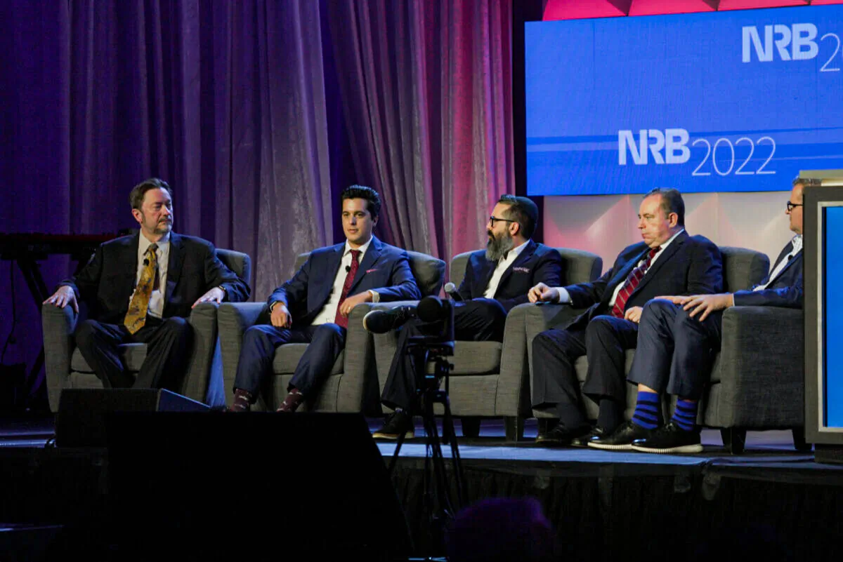 (L–R) Phil Boyce, senior vice president for Spoken Word Format at Salem Media Group; Joshua Philipp, host of Crossroads at The Epoch Times; moderator Matthew Faraci, founder and president of Inspire Buzz; Christopher Ruddy, CEO of Newsmax Media; and Christopher Dolan, president and executive editor at The Washington Times participate in a panel discussion at the NRB Christian Media Convention on March 9, 2022. (Zhen Wang/The Epoch Times)