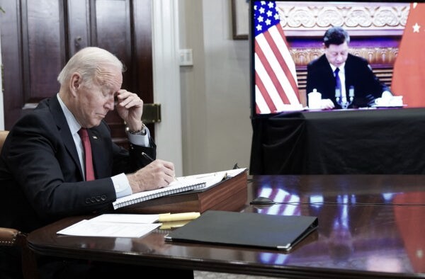 U.S. President Joe Biden gestures as he meets with Chinese leader Xi Jinping during a virtual summit from the Roosevelt Room of the White House on Nov. 15, 2021. (Mandel Ngan/AFP via Getty Images)