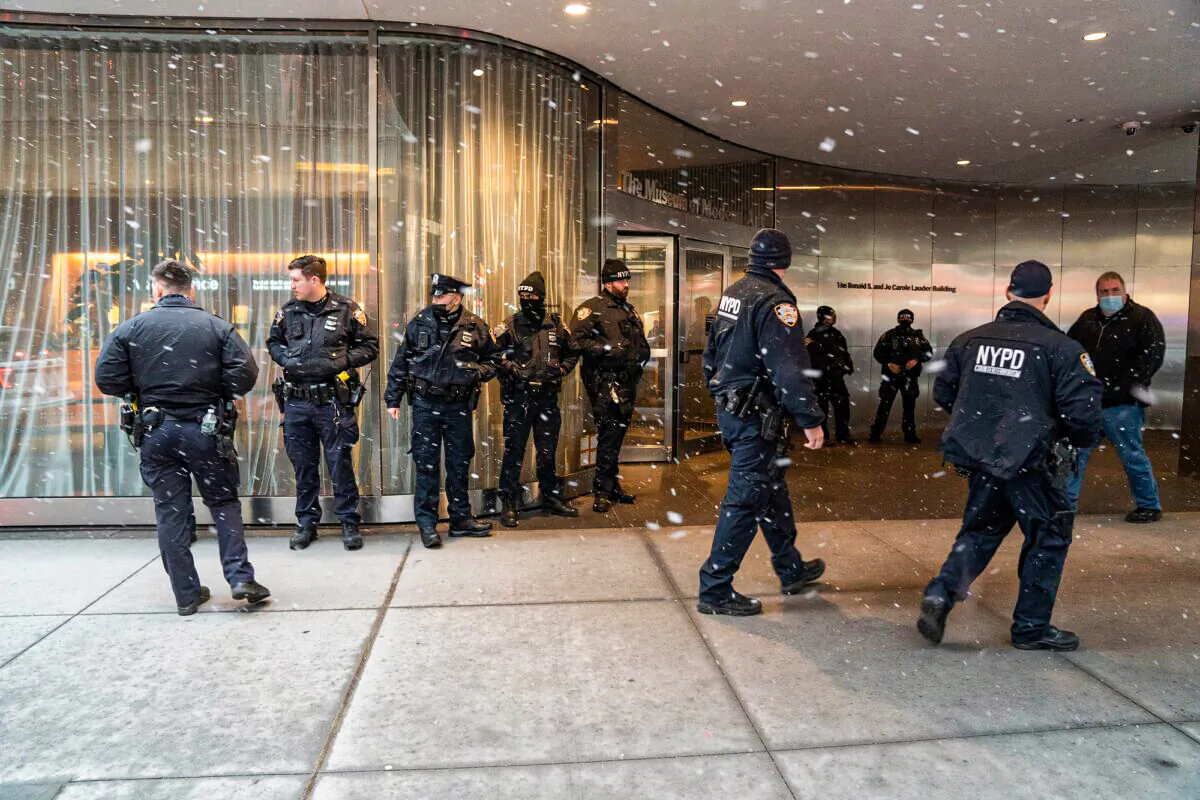 NYPD officers investigate a double stabbing inside the lobby of MOMA, New York, on March 11, 2022. (Barry Williams/New York Daily News/TNS)