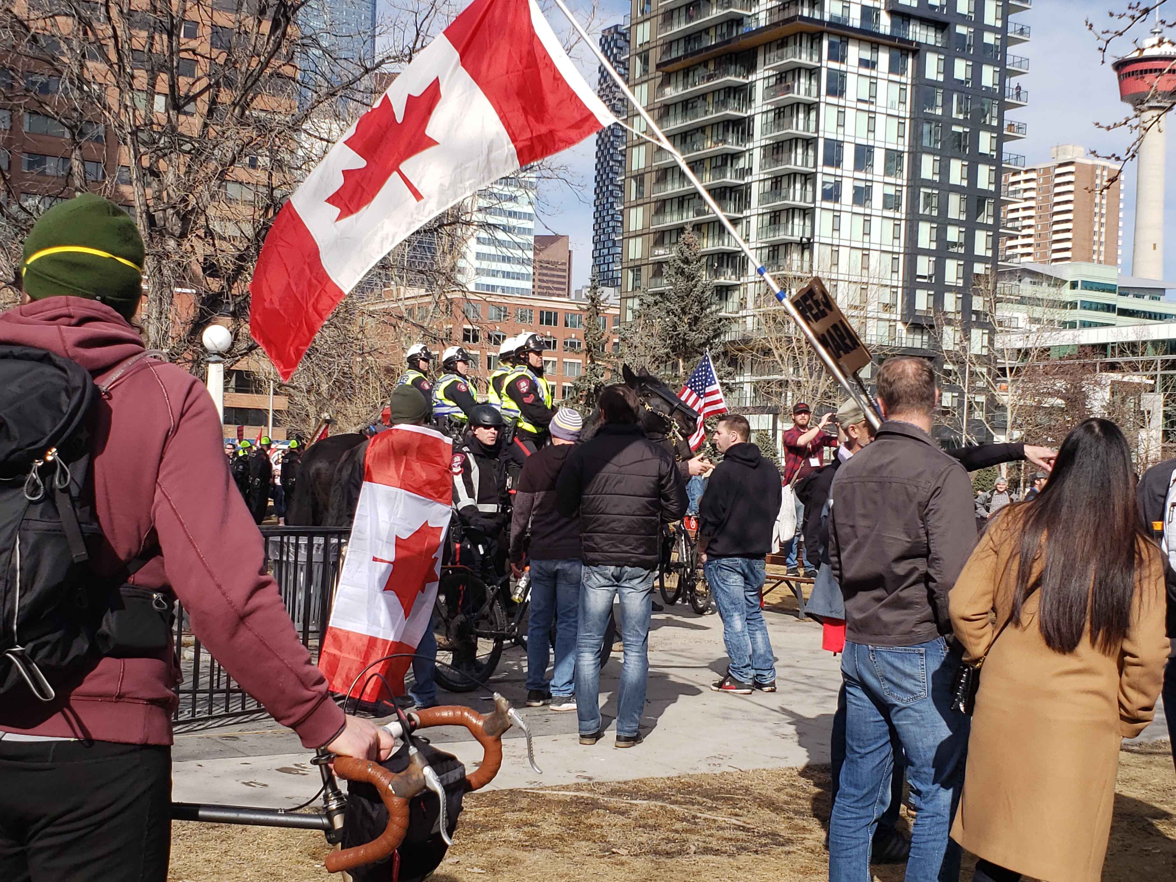 Video: 'Freedom Rally' Heats Up in Calgary as Supporters, Counter-Protesters Confront Each Other - Vimarsana News