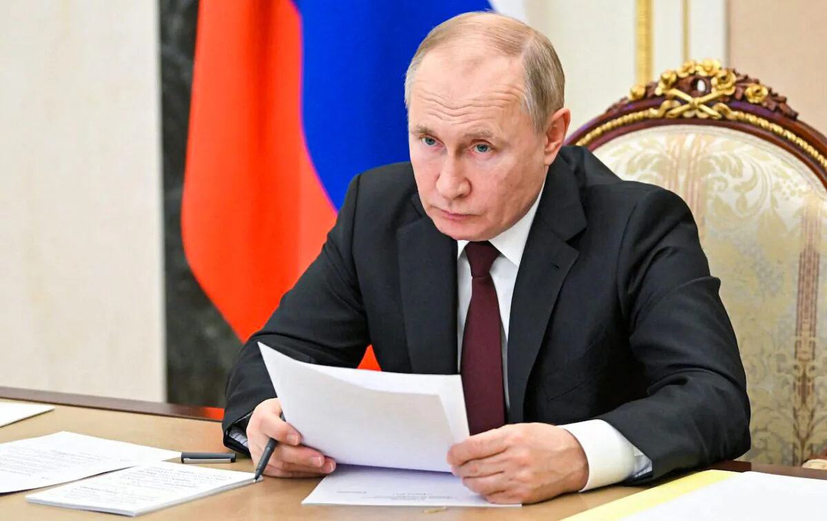Russia's President Vladimir Putin chairs a meeting on economic issues in Moscow, on Feb. 17, 2022. (Alexey Nikolsky/Sputnik/AFP via Getty Images)