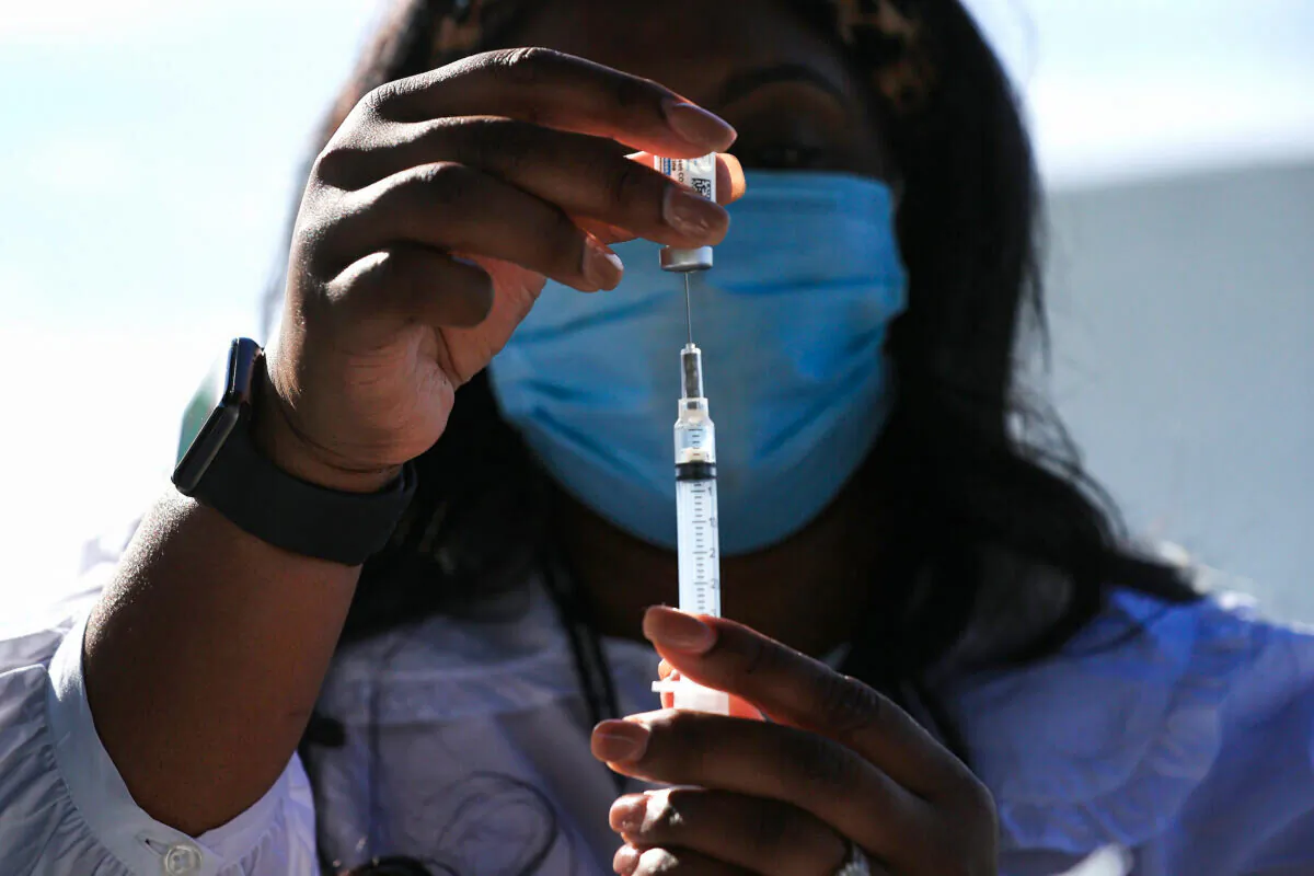 A vaccine is prepared at a clinic in Washington in a file image. (Chip Somodevilla/Getty Images)