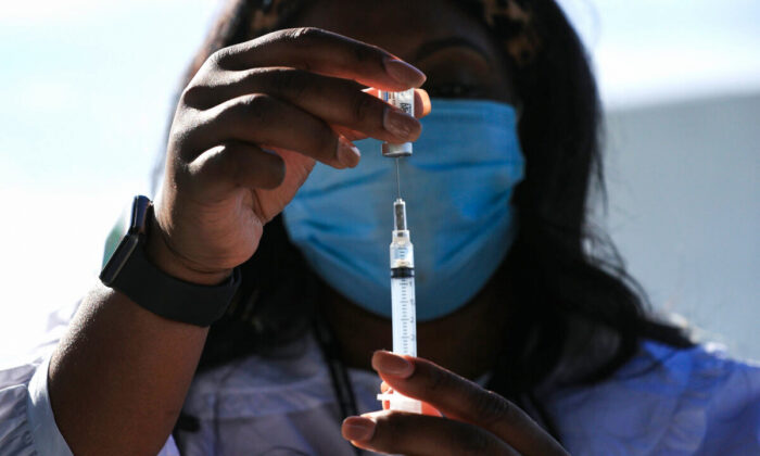 A vaccine is prepared at a clinic in Washington in a file image. (Chip Somodevilla/Getty Images)