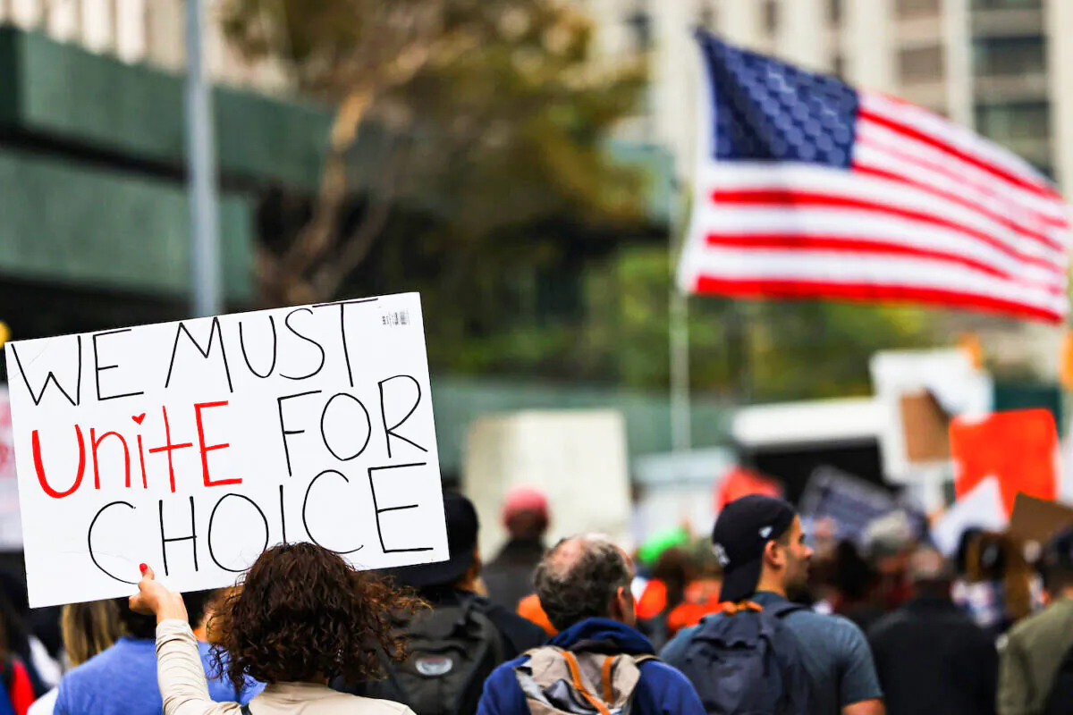People march at a vaccine mandate protest in New York on Oct. 4, 2021. (Michael M. Santiago/Getty Images)