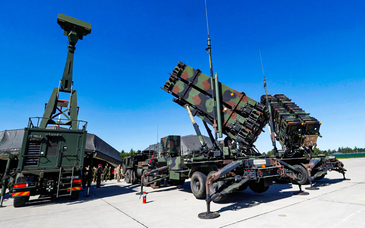 U.S. long range air defense systems Patriot (R) and British radar Giraffe AMB are displayed during Toburq Legacy 2017 air defence exercise in the military airfield near Siauliai, Lithuania, on July 20, 2017. (Ints Kalnins/Reuters)