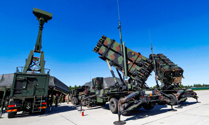 U.S. long range air defense systems Patriot (R) and British radar Giraffe AMB are displayed during Toburq Legacy 2017 air defence exercise in the military airfield near Siauliai, Lithuania, on July 20, 2017. (Ints Kalnins/Reuters)
