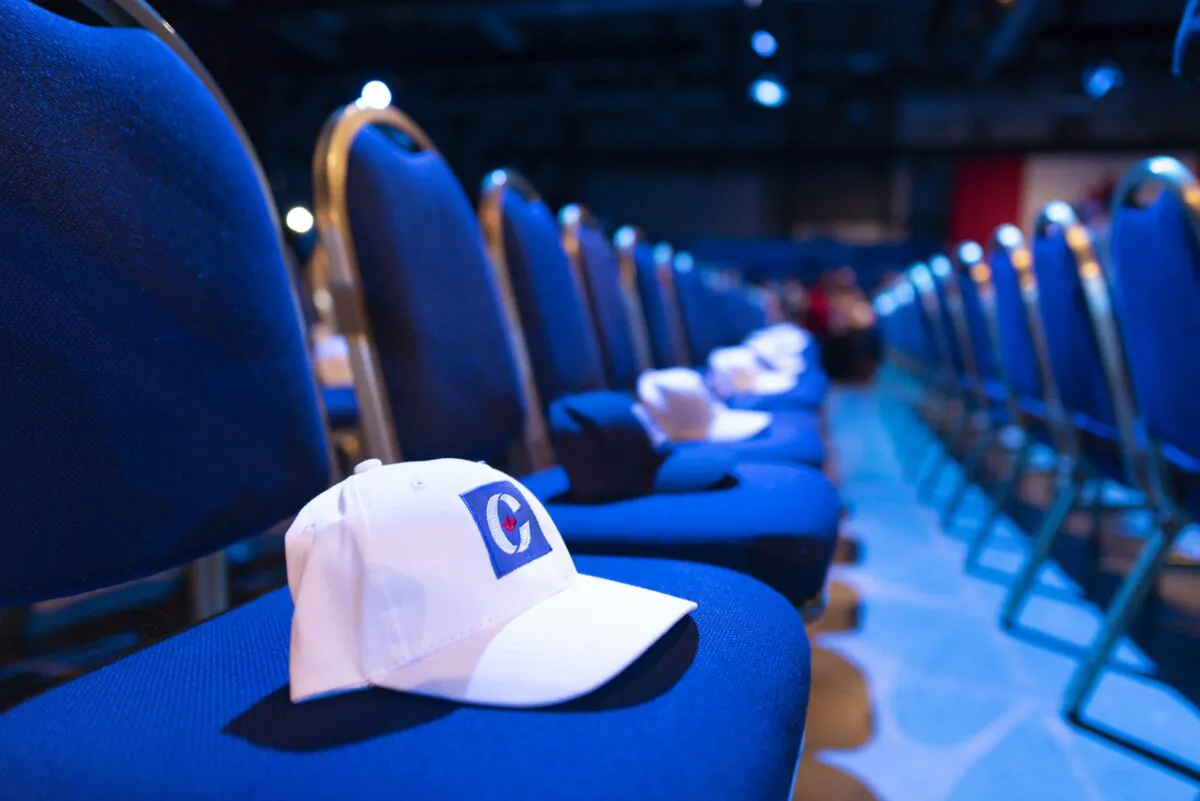 Hats wait to be claimed by VIPs in a reserved seating area at Conservative Party HQ on Election Day in Regina on Oct. 21, 2019. (The Canadian Press/Michael Bell)