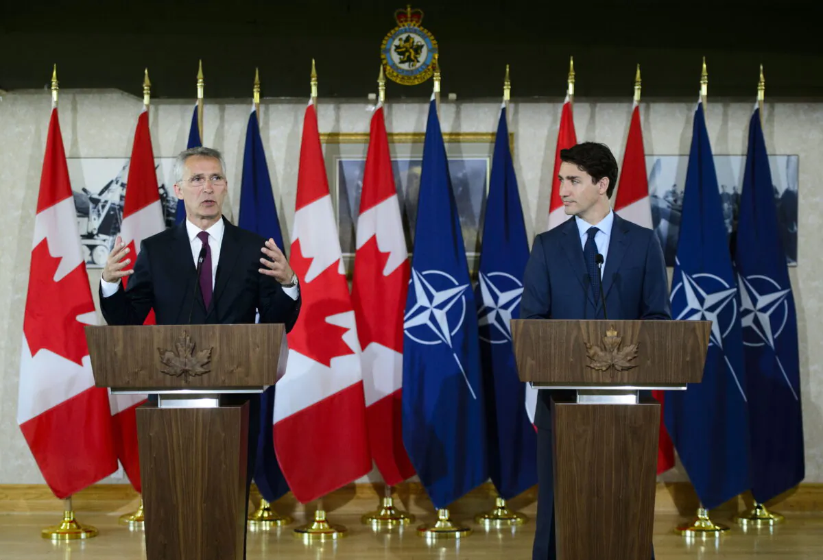 Prime Minister Justin Trudeau takes part in a joint press conference with Secretary General of the North Atlantic Treaty Organization (NATO) Jens Stoltenberg at Canadian Forces Base Petawawa, Ontario on July 15, 2019. (The Canadian Press/Sean Kilpatrick)