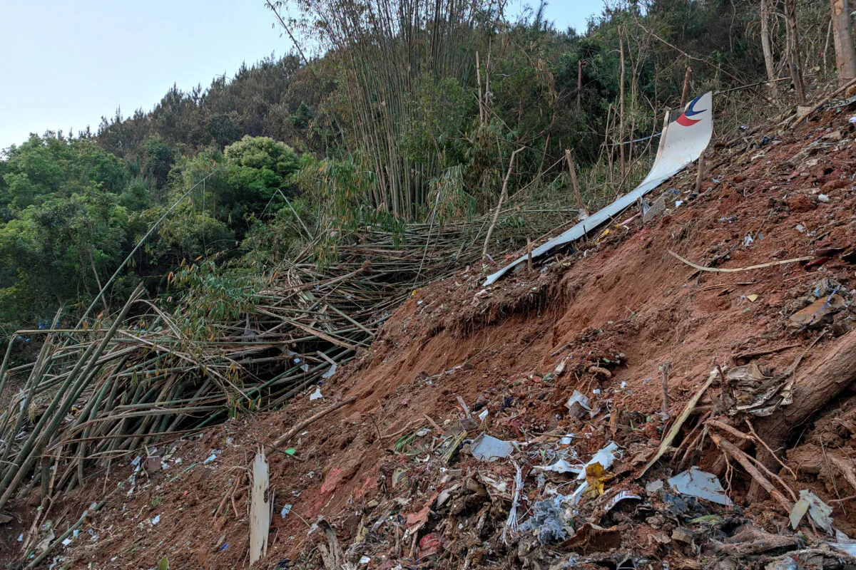 A piece of wreckage of China Eastern Airlines flight MU5735 after it crashed on the mountain in Tengxian County, Guangxi Province, China, on March 21, 2022. (Xinhua via AP)